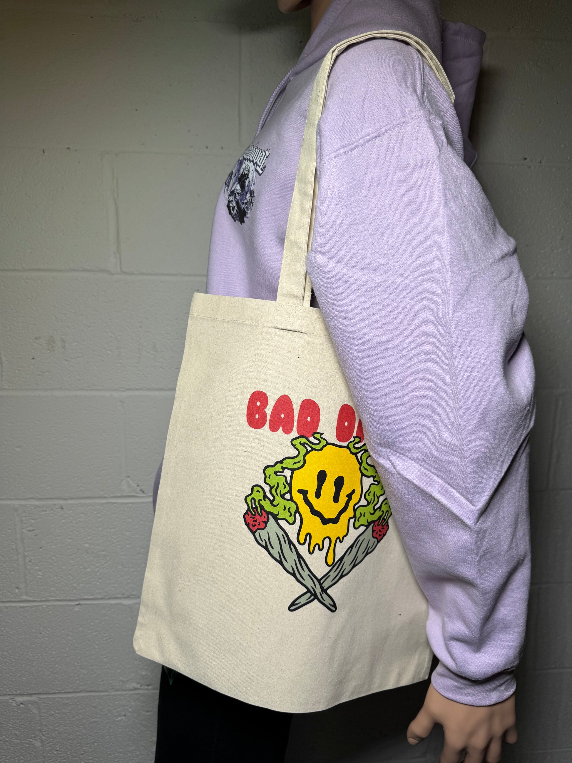 Front view of Bad Days Canvas Tote with bold "Bad Days" print, made from 100% cotton canvas.