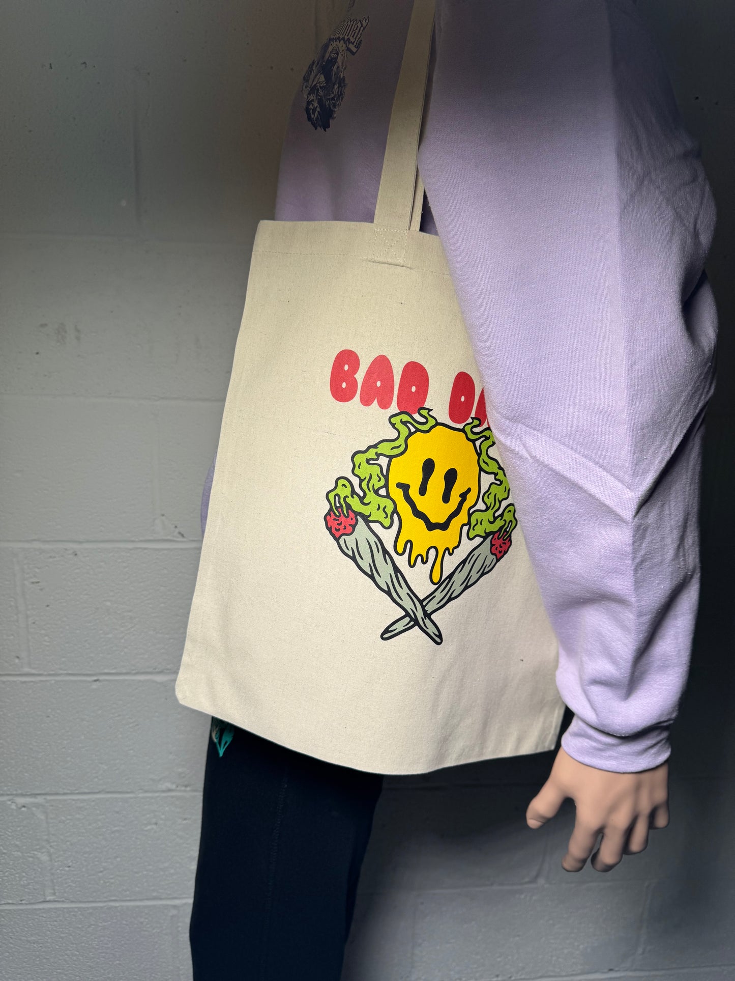 Front view of Bad Days Canvas Tote with bold "Bad Days" print, made from 100% cotton canvas.