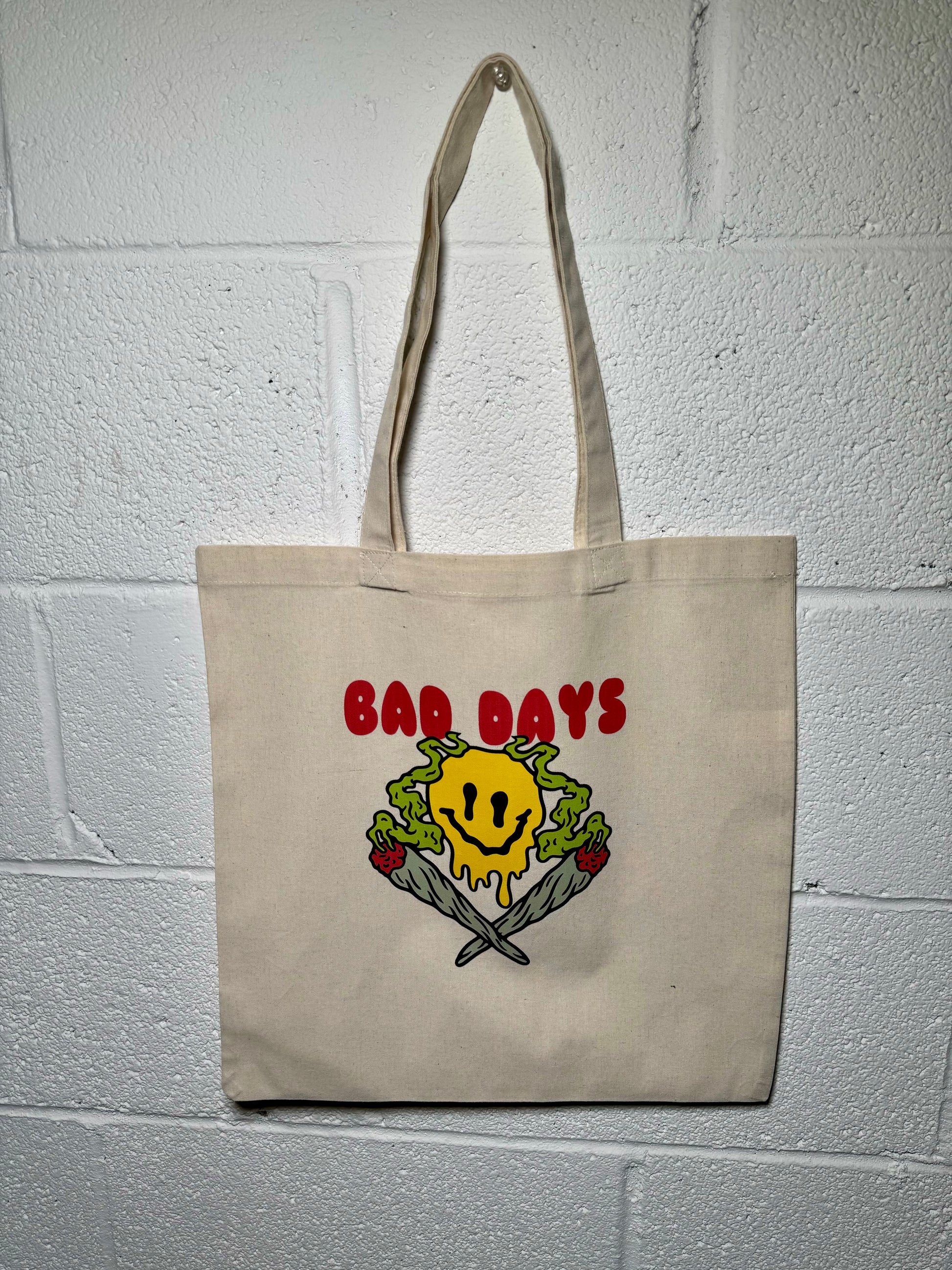 Front view of Bad Days Canvas Tote with bold "Bad Days" print, made from 100% cotton canvas.