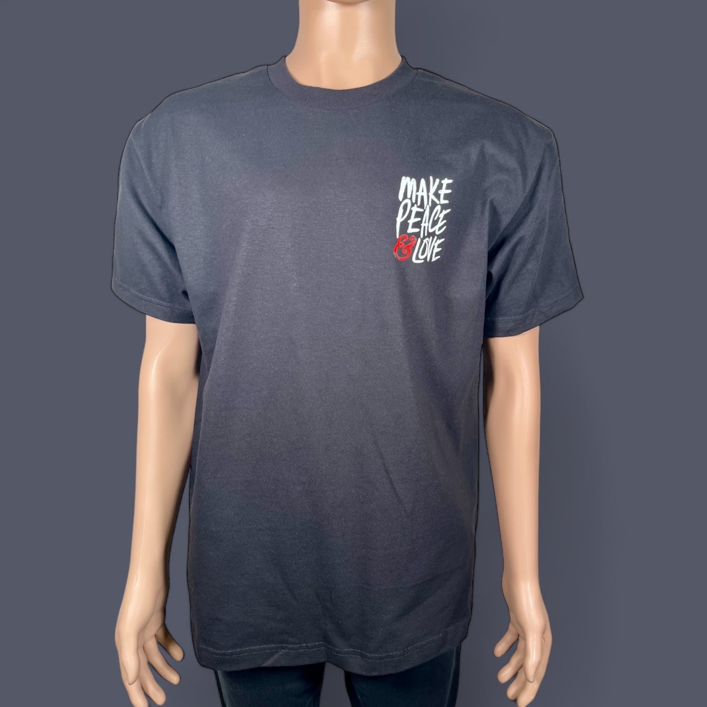 "MAKE PEACE & LOVE T-Shirt with white and red left print, made from 100% preshrunk cotton. Unisex design, showcasing a message of peace and love."