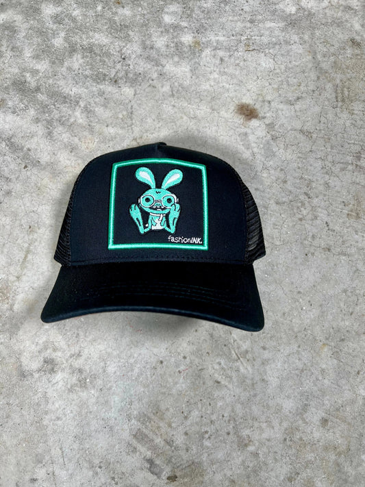 "Embroidered Bunny Trucker Hat by fashionINK with breathable mesh back and adjustable snapback closure"