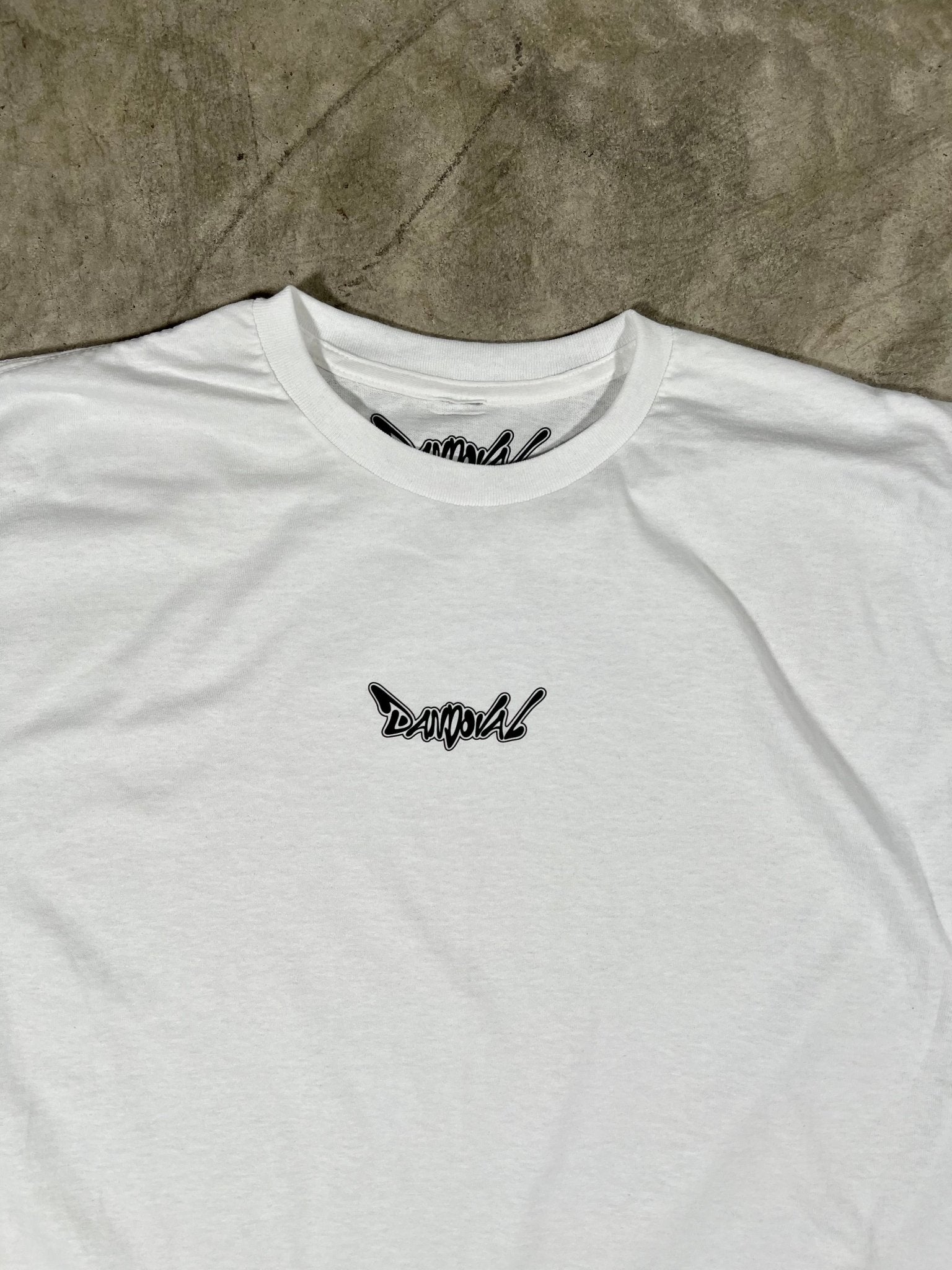 "DANDOVAL OG Logo T-Shirt in white, showcasing comfortable 4.3 oz. combed ringspun cotton fabric and iconic OG logo design."