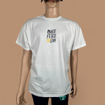 White t-shirt with 'Make Peace Love' text on a brown background
