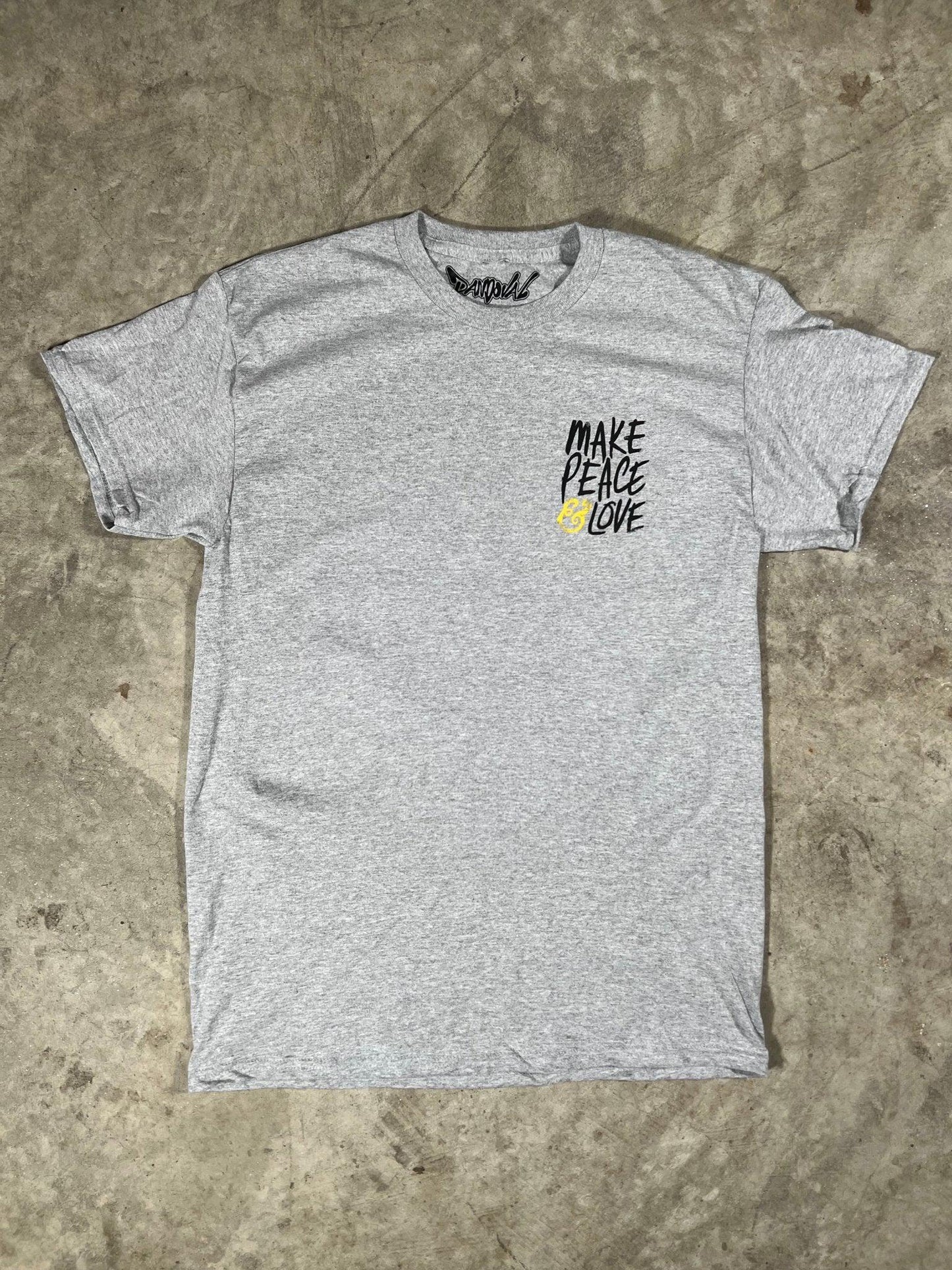 Gray t-shirt with 'Make Peace Love' text on a textured surface