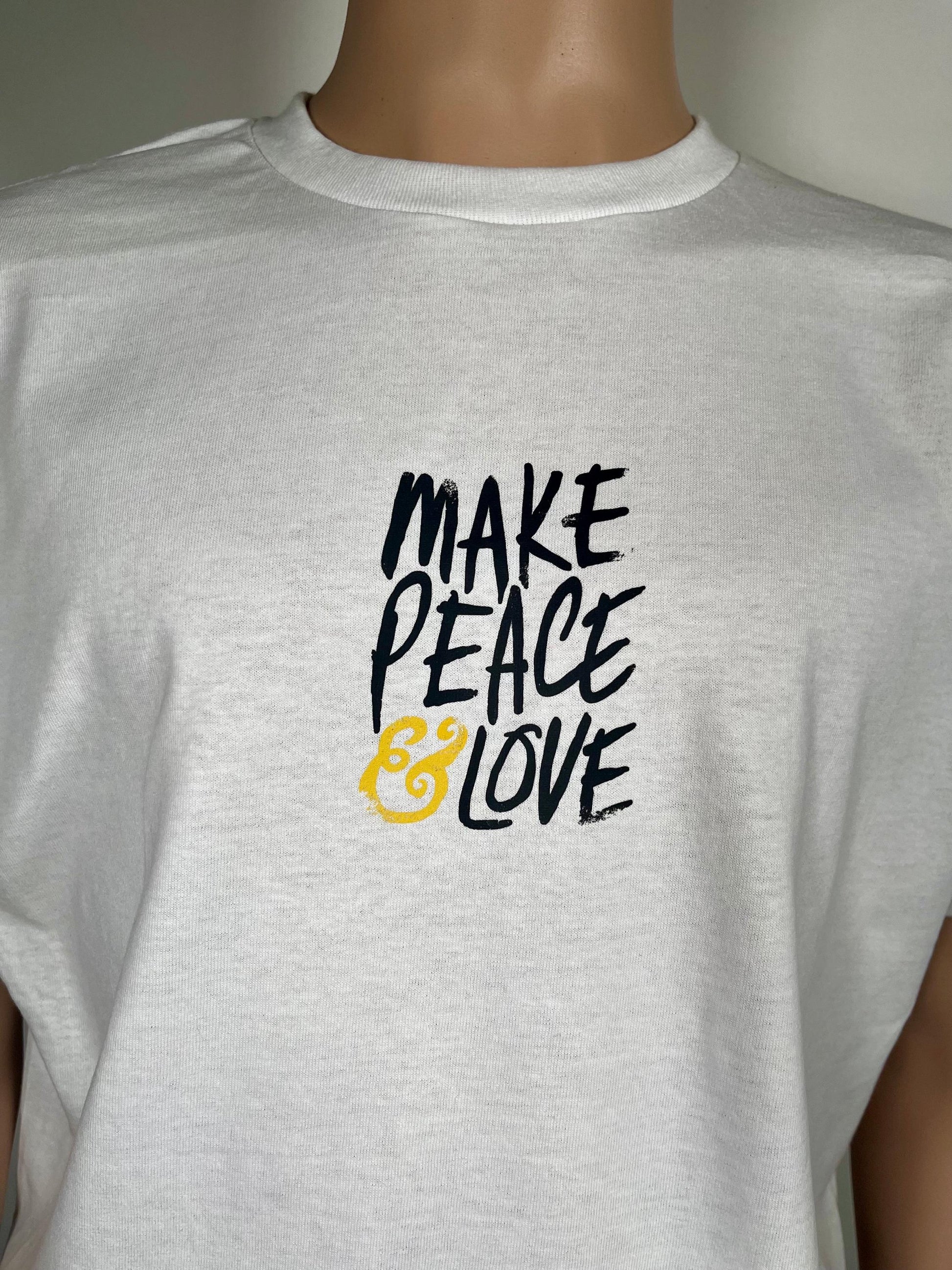 Gray t-shirt with 'MAKE PEACE & LOVE' text on a mannequin
