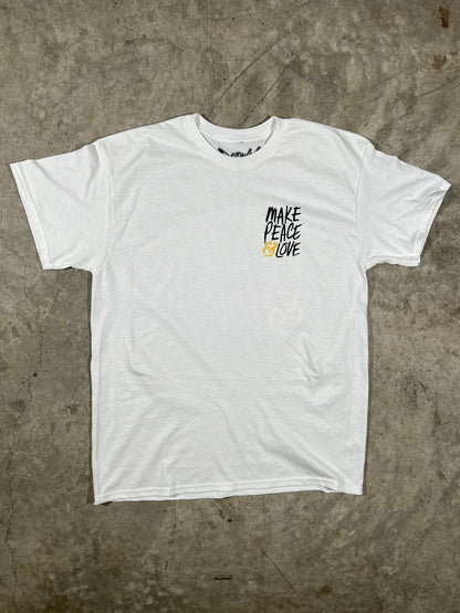 White t-shirt with 'Make Peace Love' text on a textured surface