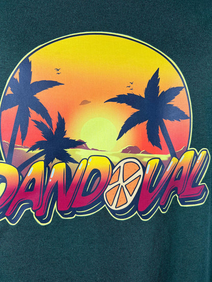 T-shirt with a colorful design of palm trees and a sunset, featuring the word 'DANDOVAL'.