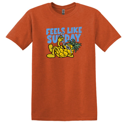Orange t-shirt with a pineapple graphic and 'Feels Like Sunday' text on a white background